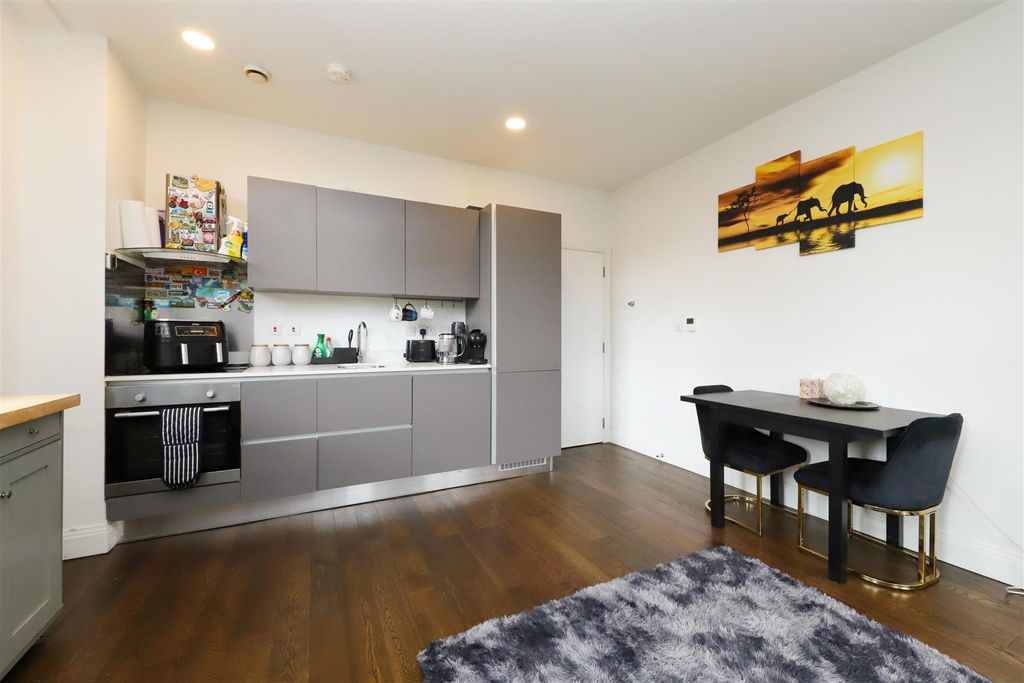 Property photo 3 of 11 Kitchen Living Room