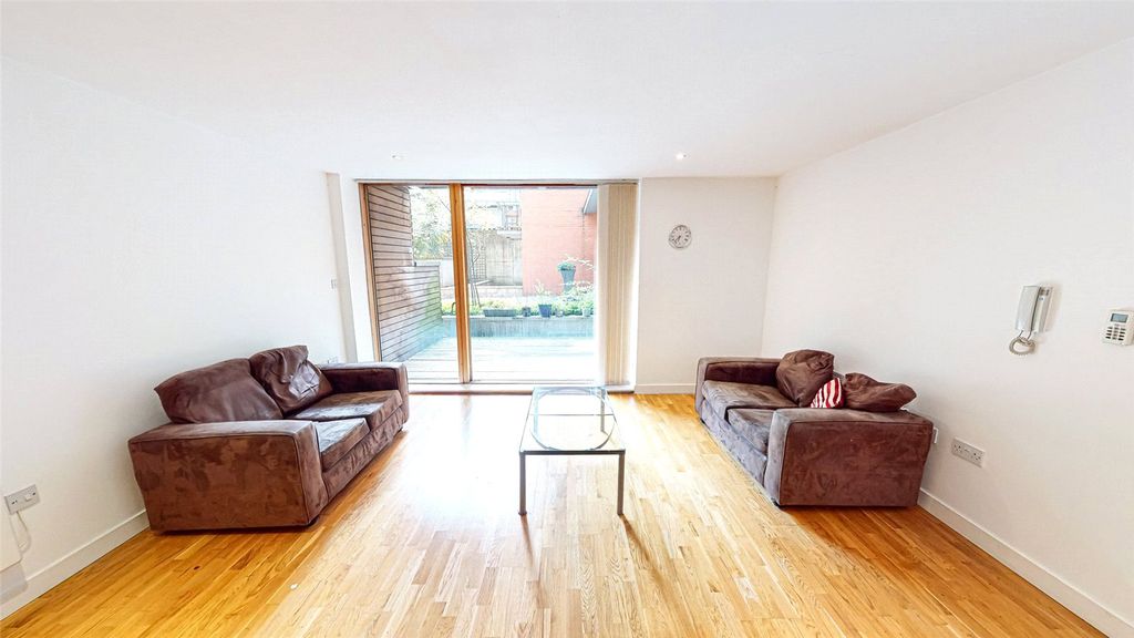 Property photo 1 of 12 Living Area