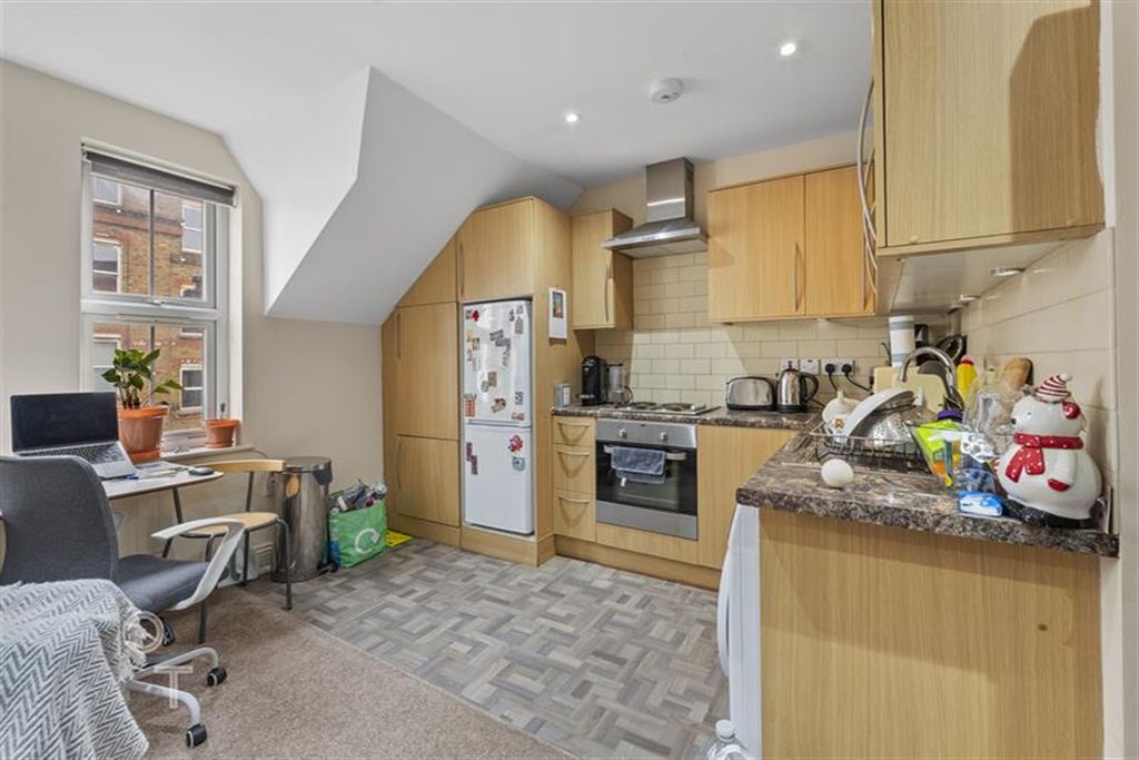 Property photo 2 of 8 Kitchen