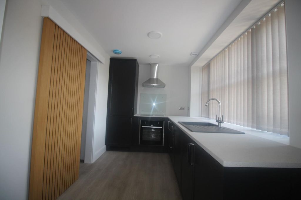 Property photo 3 of 12 Kitchen