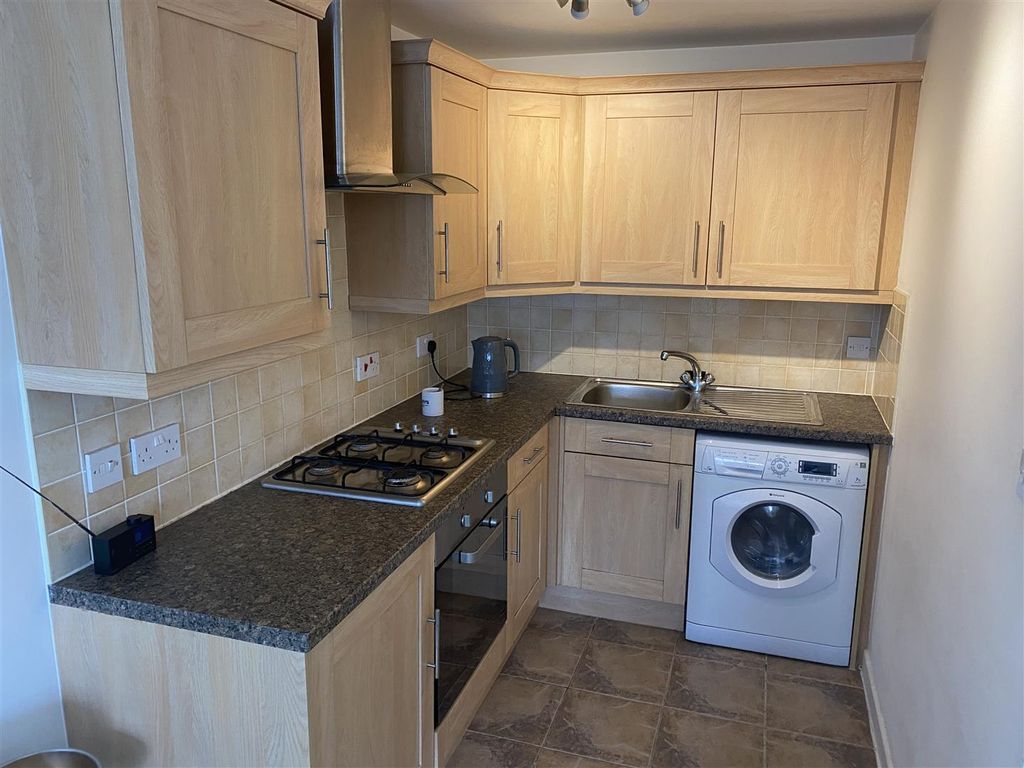 Property photo 3 of 6 Kitchen Area