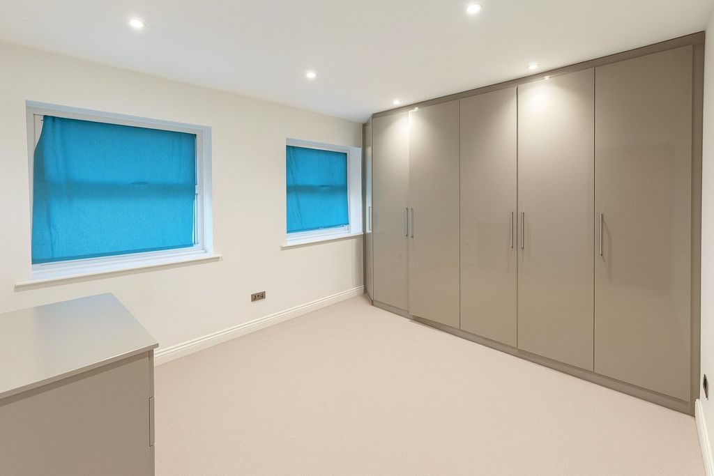 Property photo 3 of 5 Bedroom One