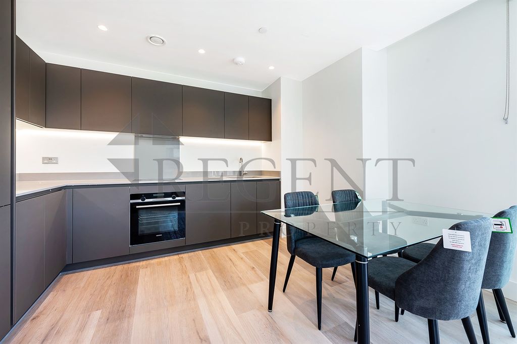 Property photo 3 of 12 Kitchen &amp; Dining