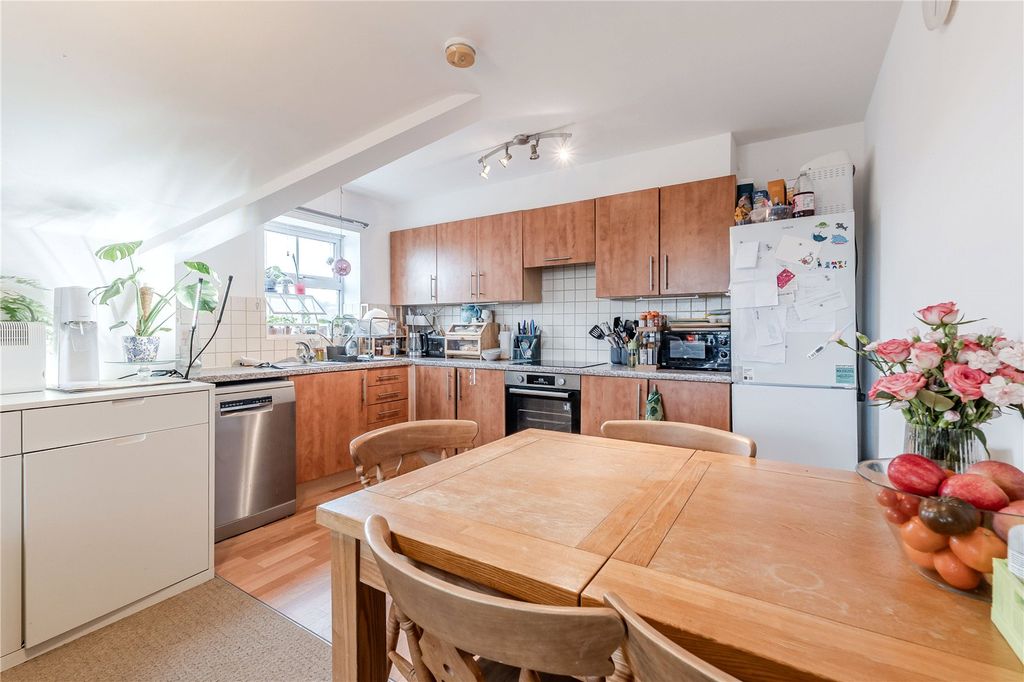 Property photo 3 of 12 Dining Kitchen