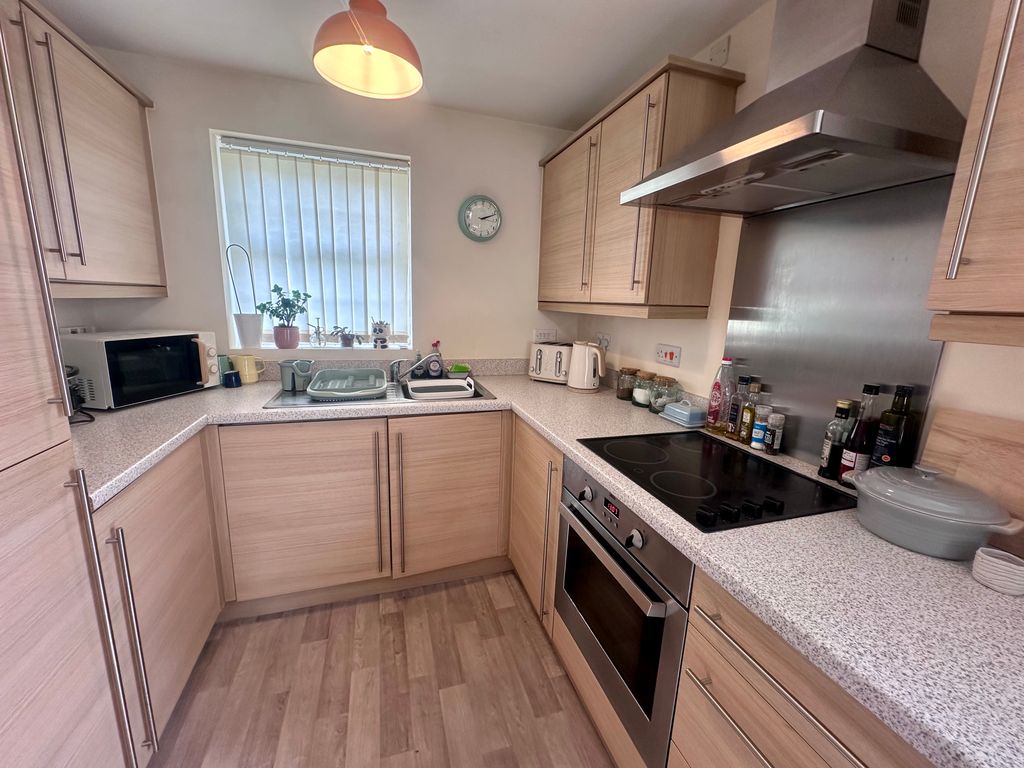 Property photo 3 of 9 Kitchen Area