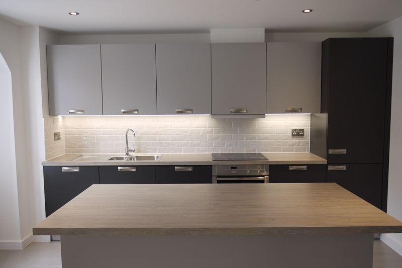 Property photo 2 of 12 Kitchen Area