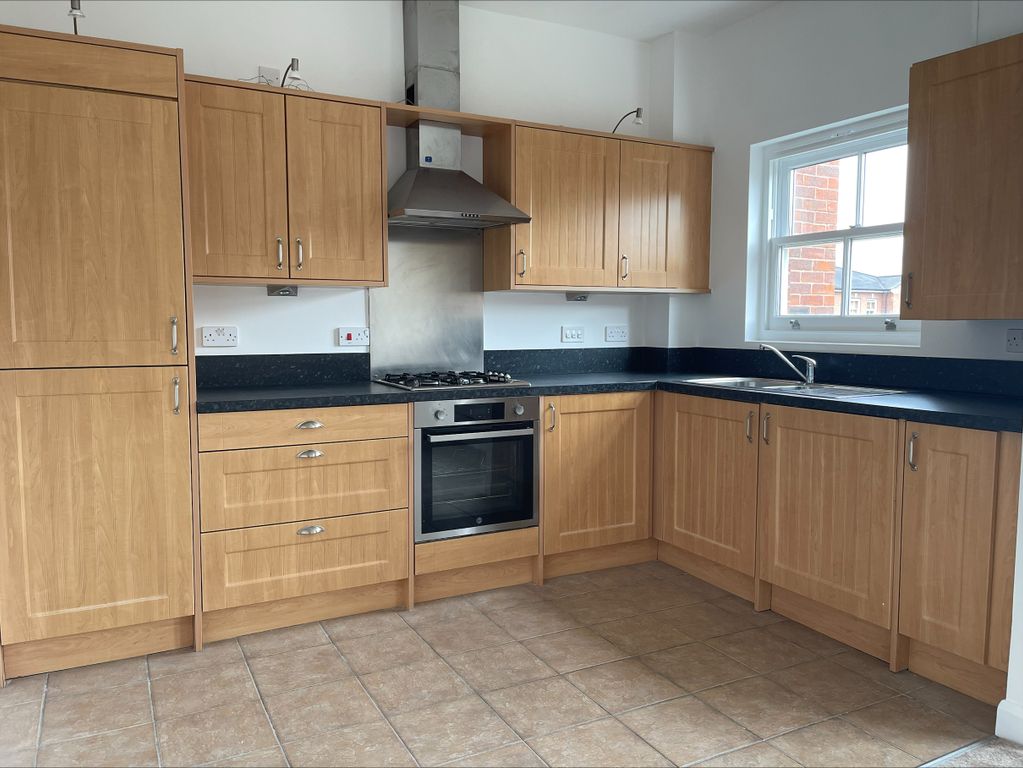 Property photo 2 of 12 Kitchen
