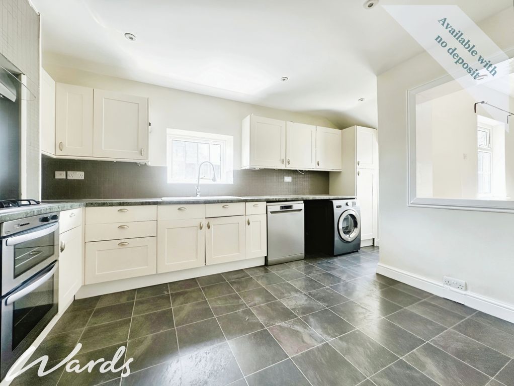 Property photo 3 of 12 d95456Ab-Kitchen