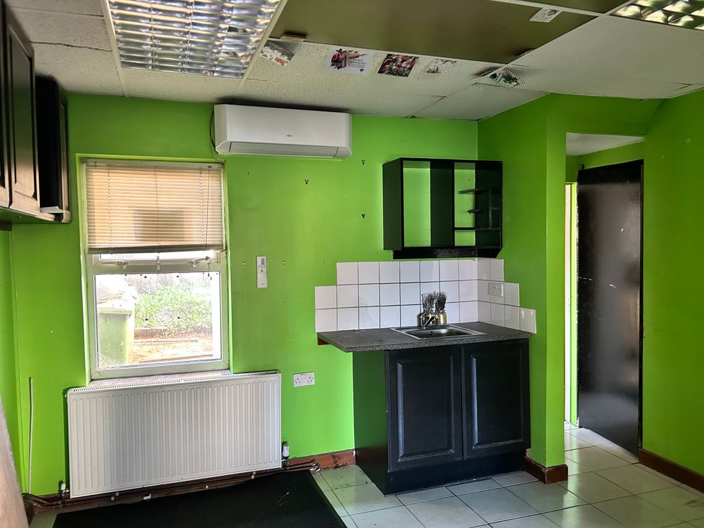 Property photo 3 of 7 Rear Sales