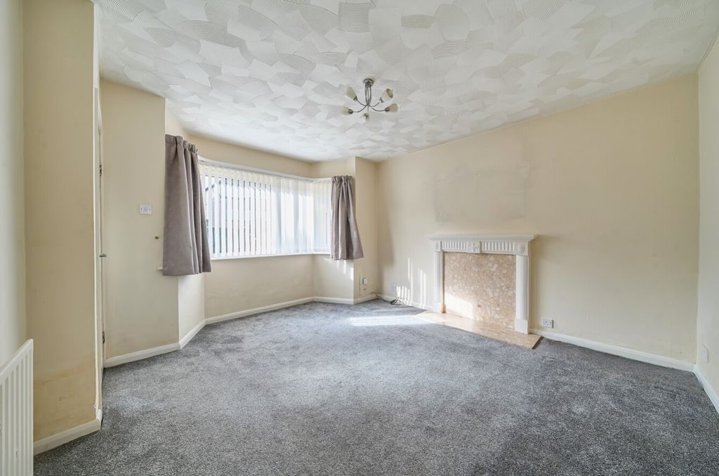 Property photo 3 of 12 Lounge With Fireplace