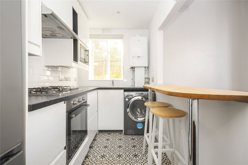 Property photo 3 of 12 Kitchen