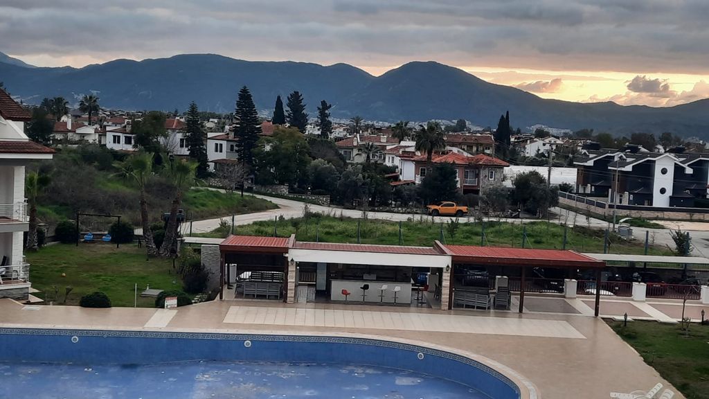 Property photo 2 of 22 Sleek Property For Sale Near The Beach In Fethiye - Communal Swimming Pool