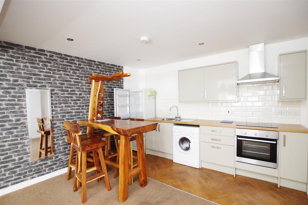 Property photo 3 of 8 Kitchen Area
