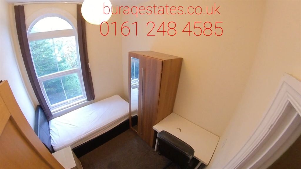 Property photo 1 of 15 A Cozy Single Bedroom Featuring A Comfortable Sing...
