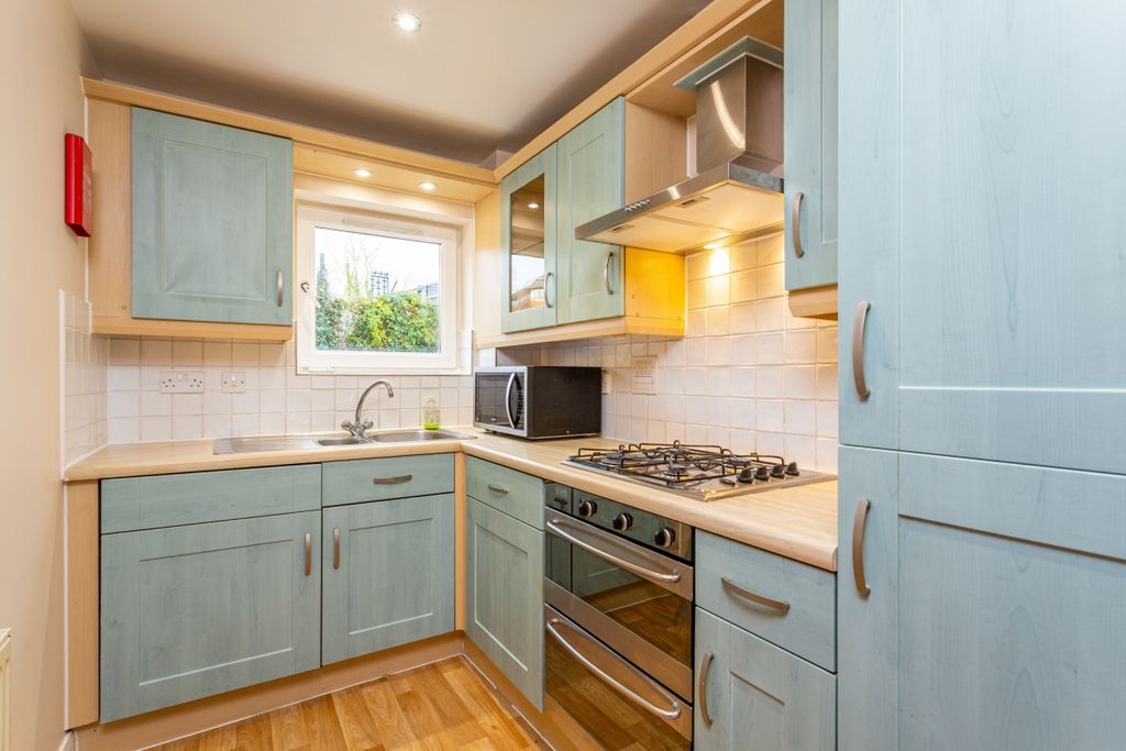 Property photo 2 of 12 Kitchen