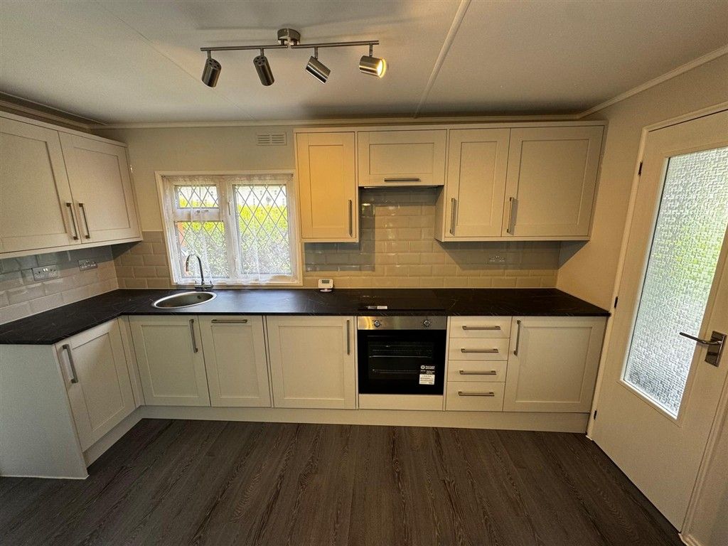 Property photo 3 of 8 Kitchen