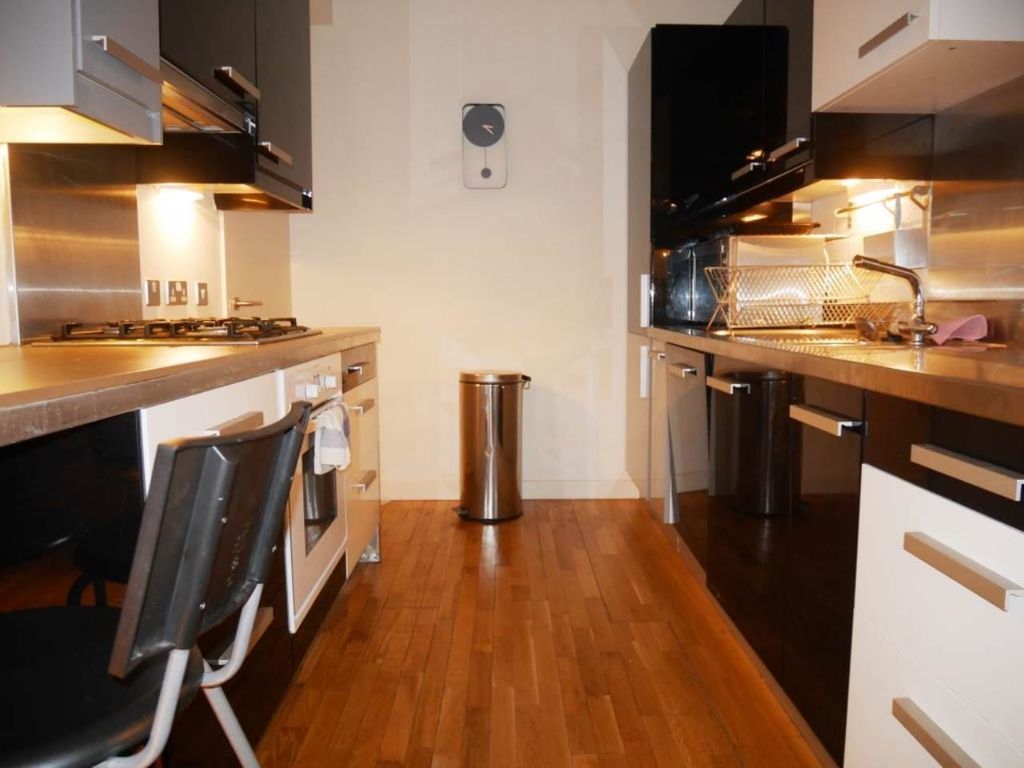 Property photo 3 of 7 Kitchen