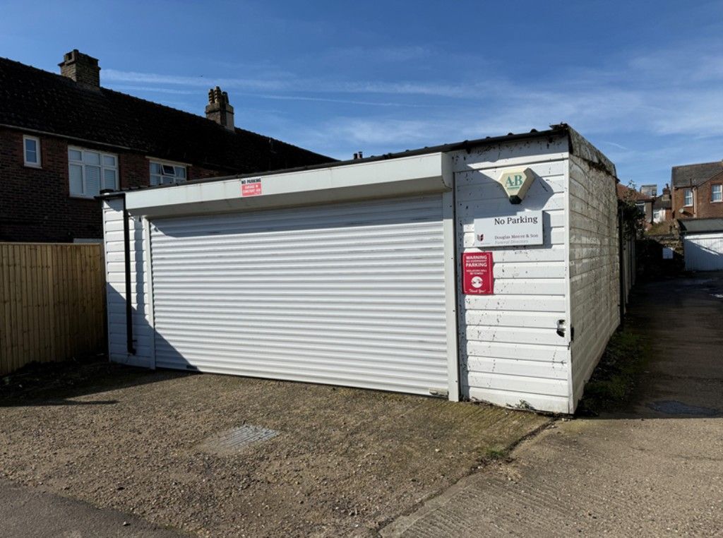 Property photo 2 of 3 Triple Garage
