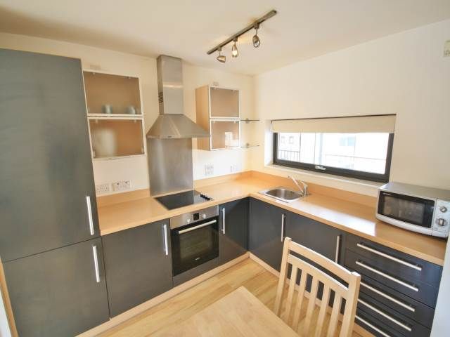 Property photo 3 of 8 Kitchen