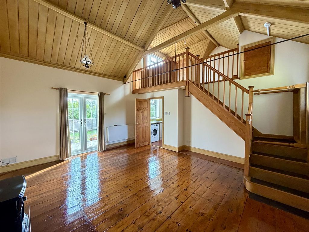 Property photo 3 of 13 Living Area