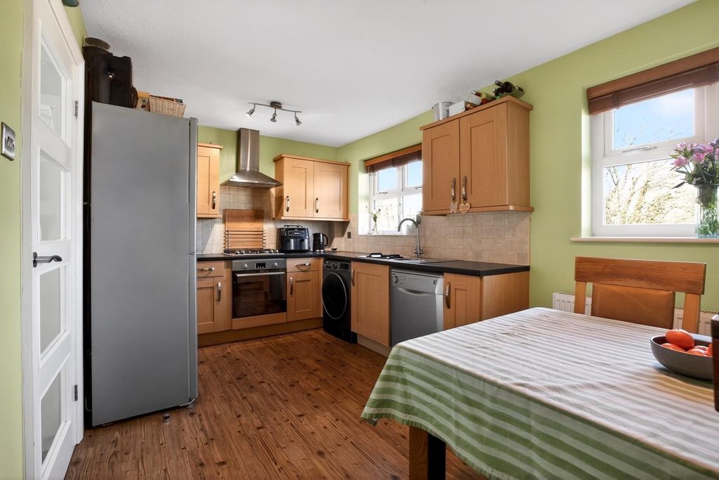 Property photo 3 of 17 Dining Kitchen