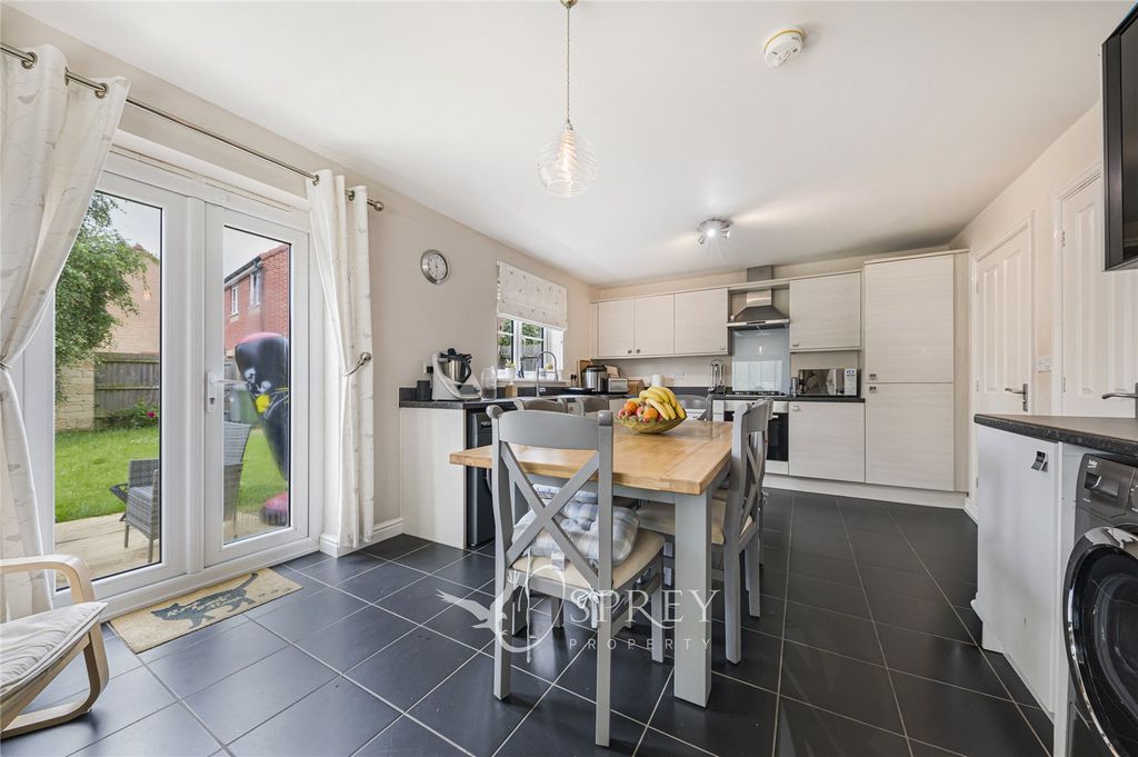 Property photo 2 of 14 Dining Kitchen