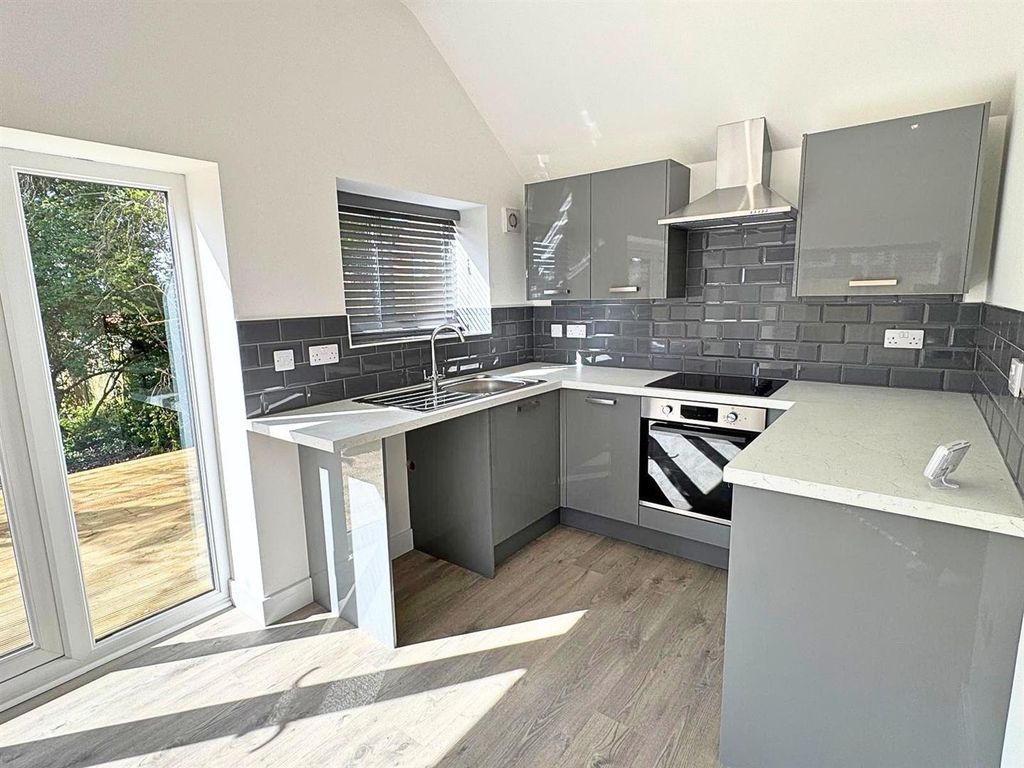 Property photo 3 of 14 Kitchen Area