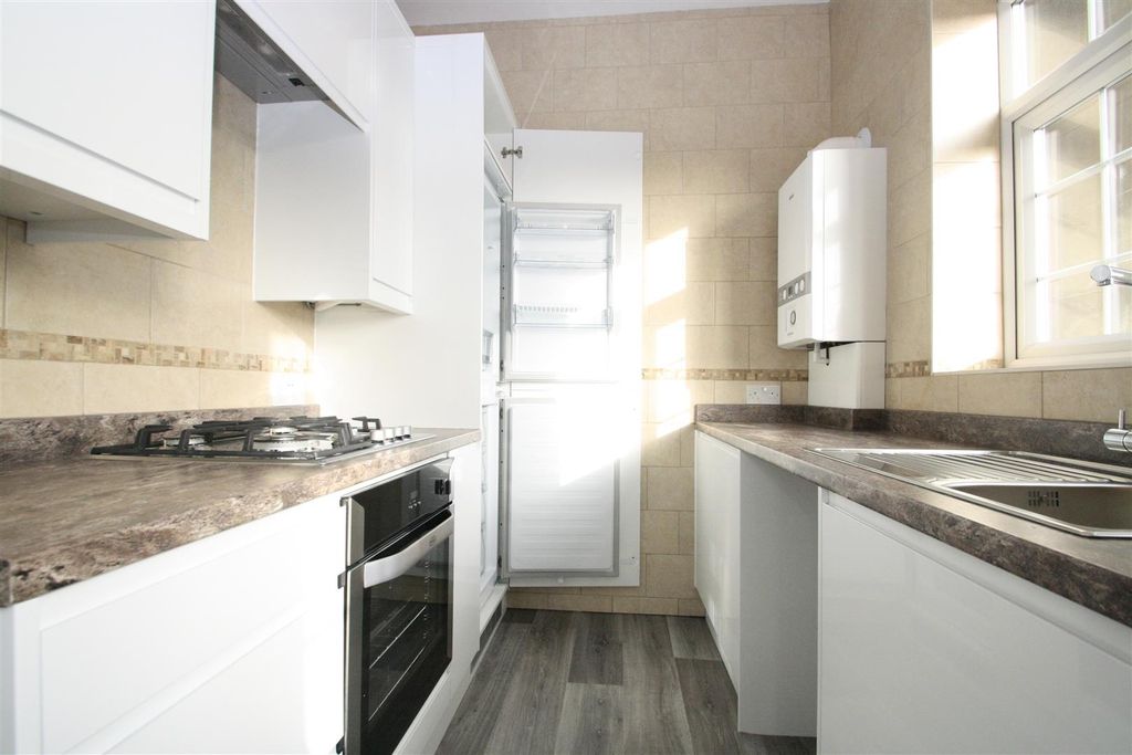 Property photo 3 of 14 Kitchen With Fridge.Jpg