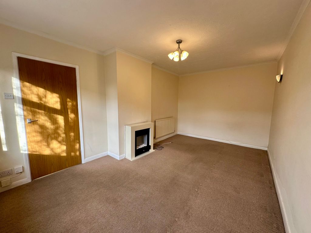 Property photo 3 of 11 Living Room 1