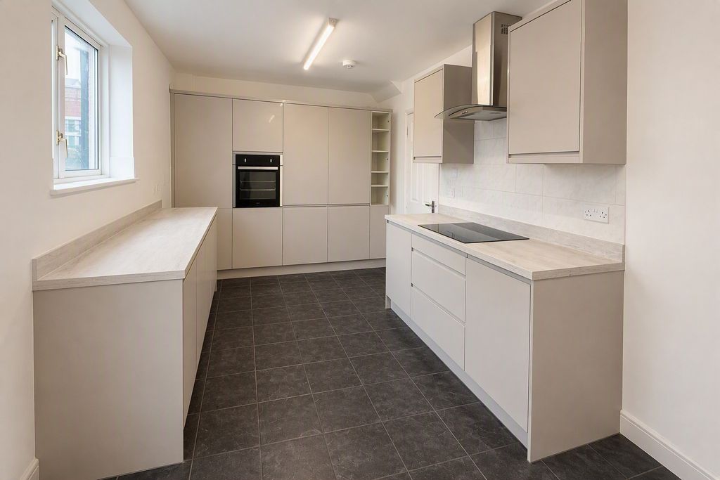 Property photo 3 of 9 Kitchen Area