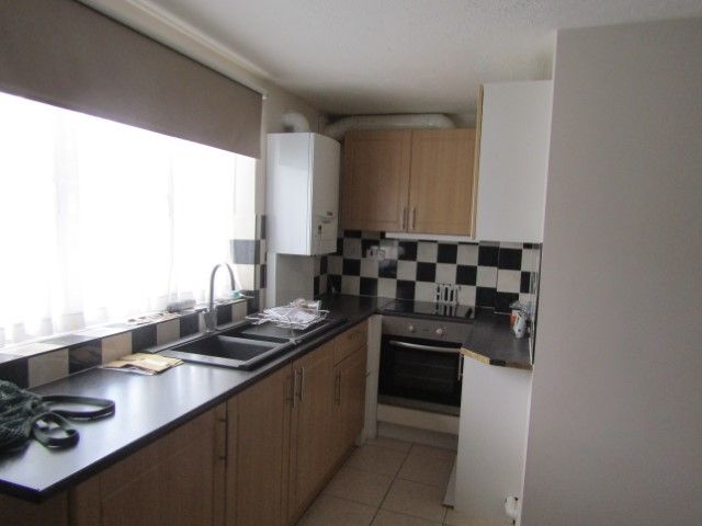 Property photo 3 of 8 Kitchen