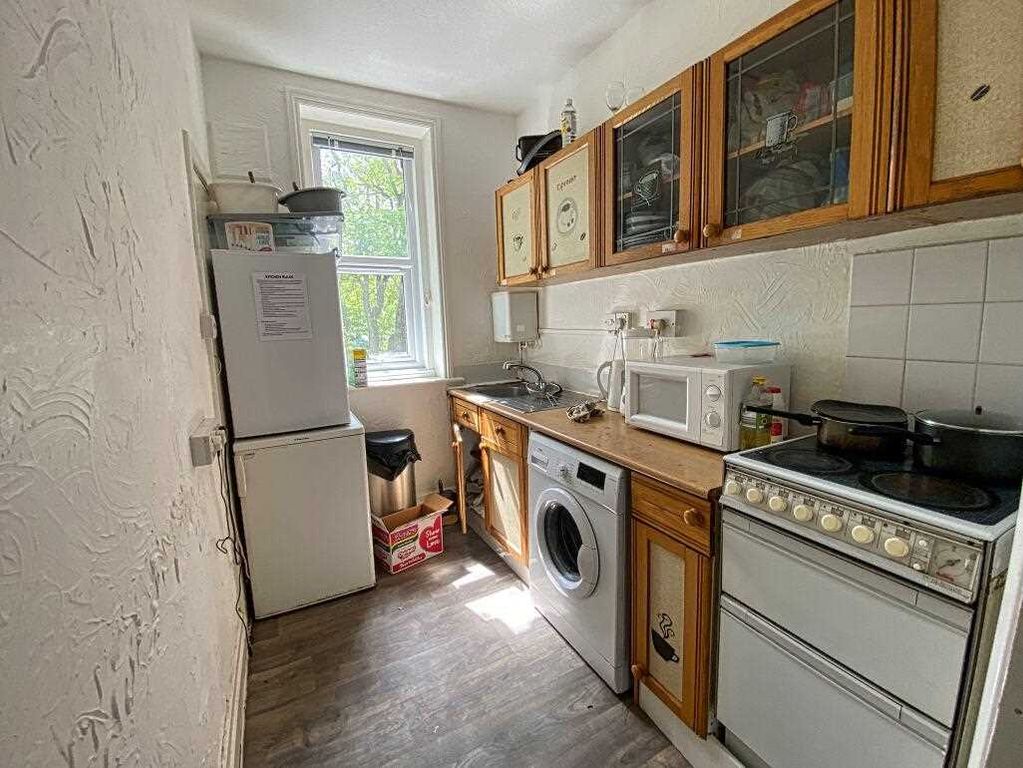 Property photo 3 of 6 Kitchen