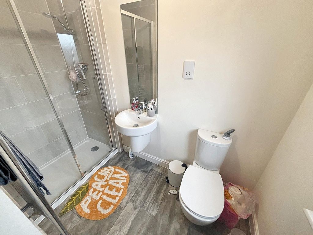 Property photo 2 of 5 A Clean And Modern Bathroom Featuring A Toilet, Sm...