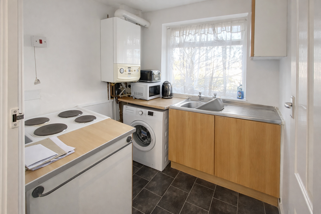 Property photo 3 of 7 Utility Room
