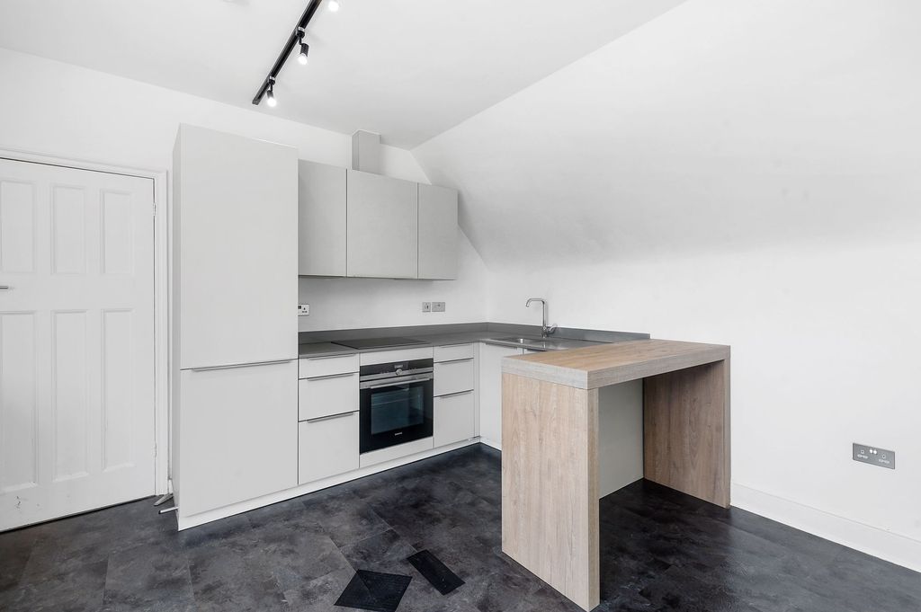 Property photo 2 of 12 Kitchen
