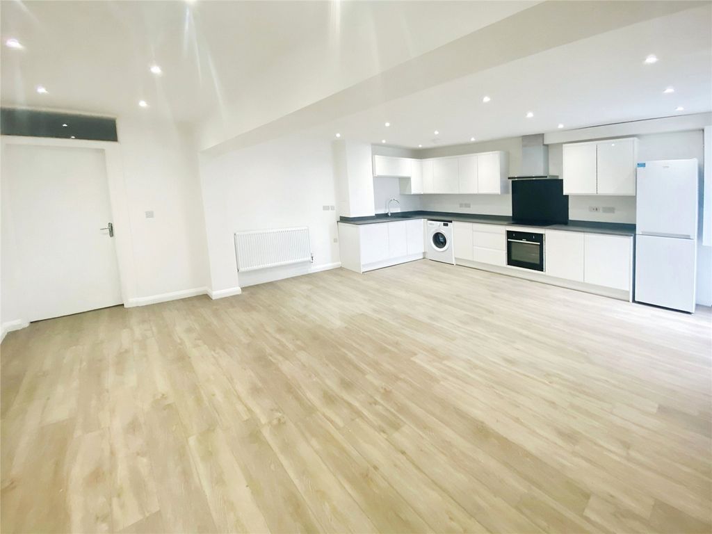 Property photo 2 of 9 Kitchen/Living Area