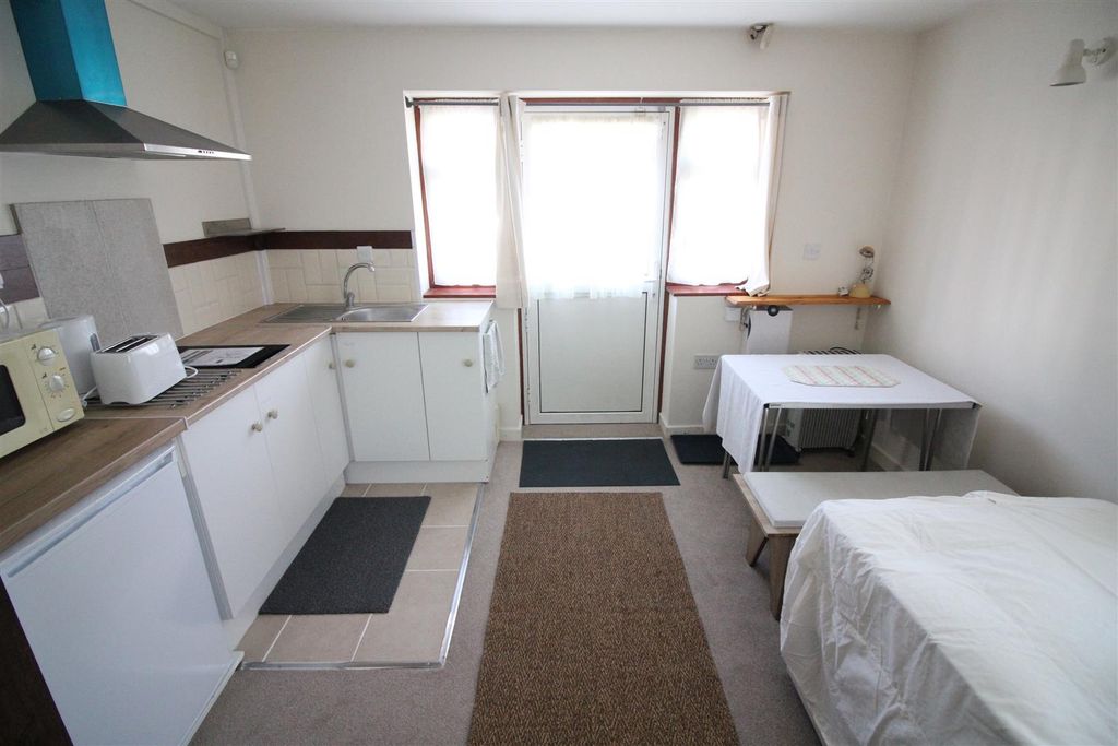 Property photo 3 of 5 Bedroom/Kitchen