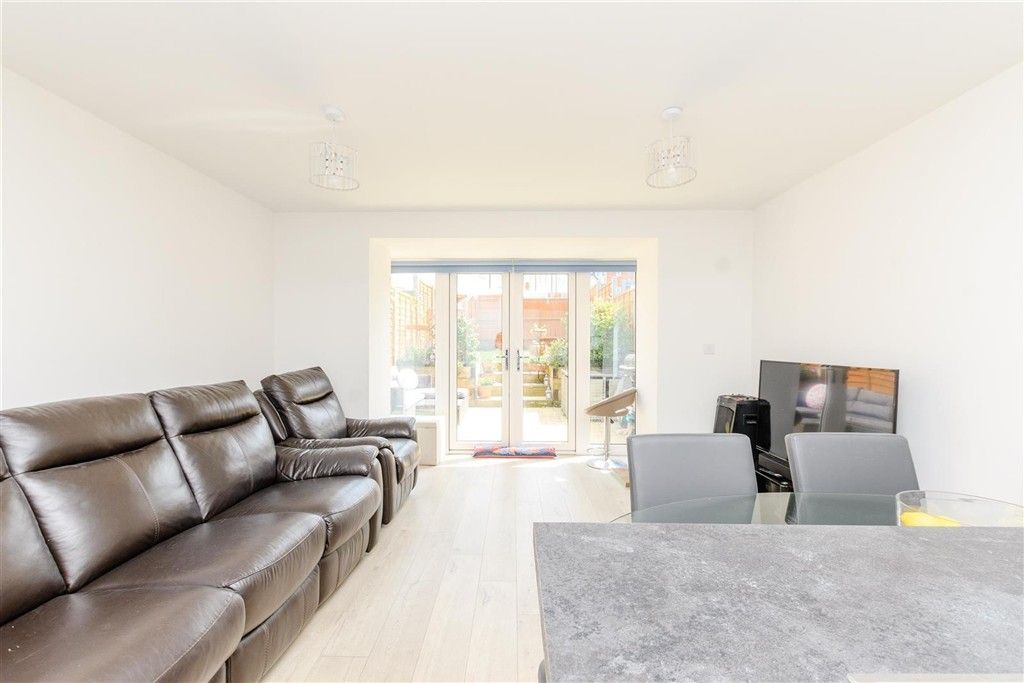 Property photo 2 of 9 Kitchen/Living Area