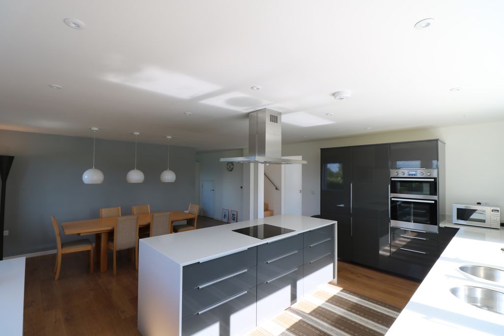 Property photo 2 of 25 Kitchen With Dining Area In Background