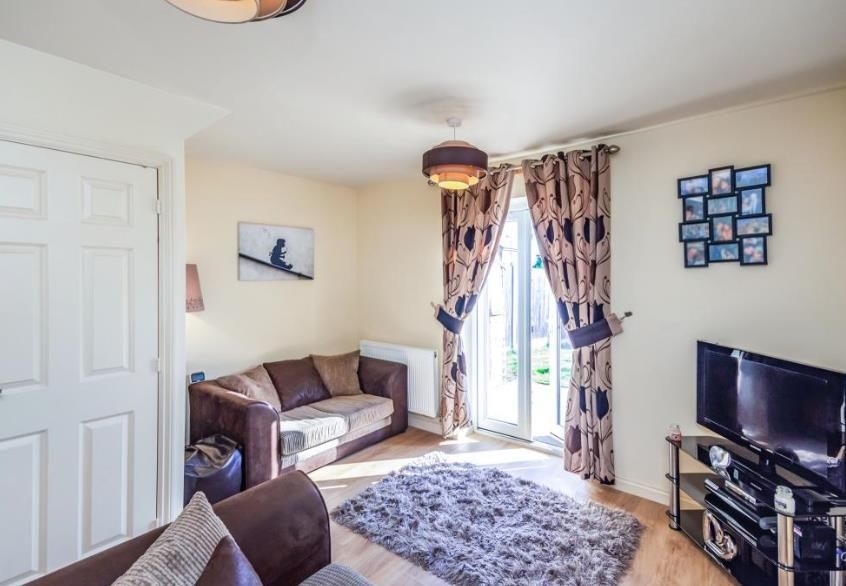 Property photo 2 of 8 Living Room