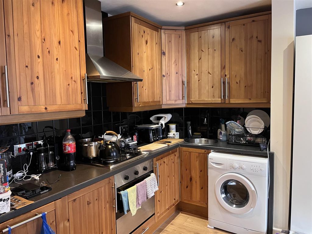 Property photo 3 of 8 Kitchen Area