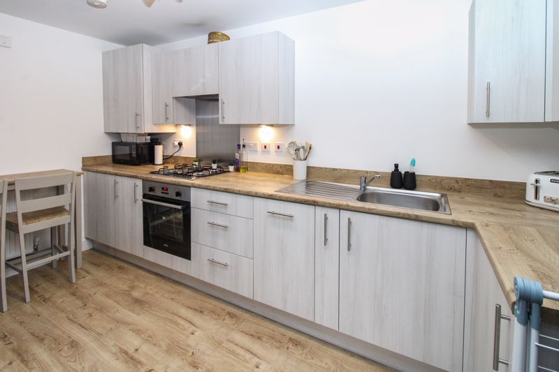 Property photo 3 of 18 Kitchen Area