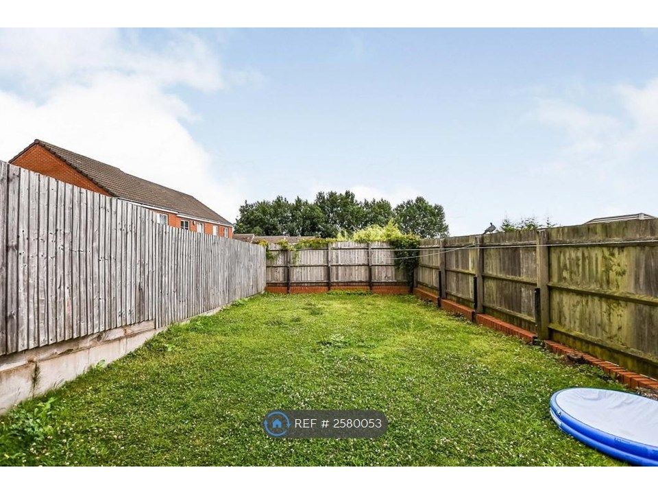Property photo 2 of 12 Backyard