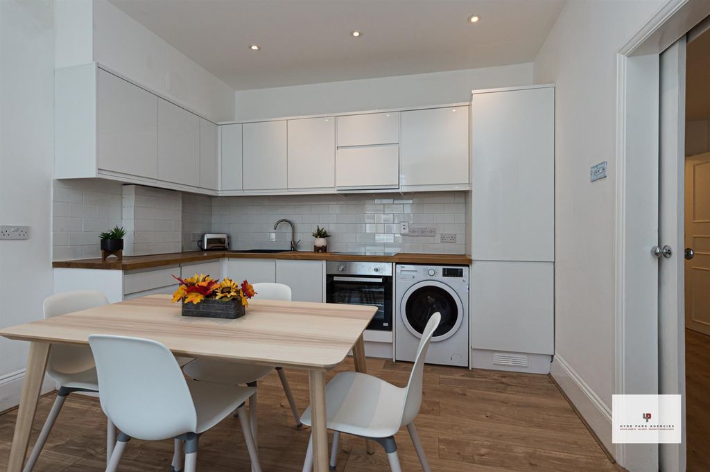 Property photo 3 of 11 Queensborough Terrace 5@37-016-016 Logo.Jpg