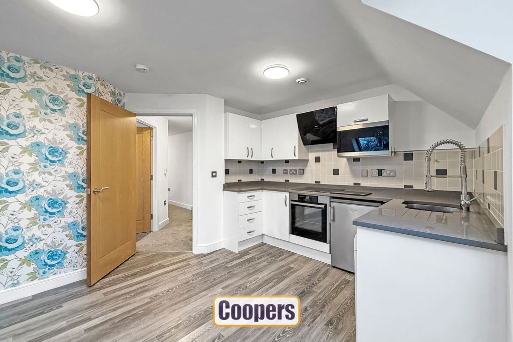 Property photo 2 of 10 Kitchen Area