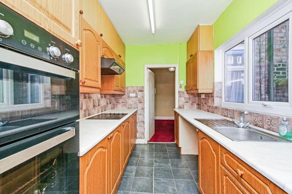 Property photo 2 of 12 Kitchen