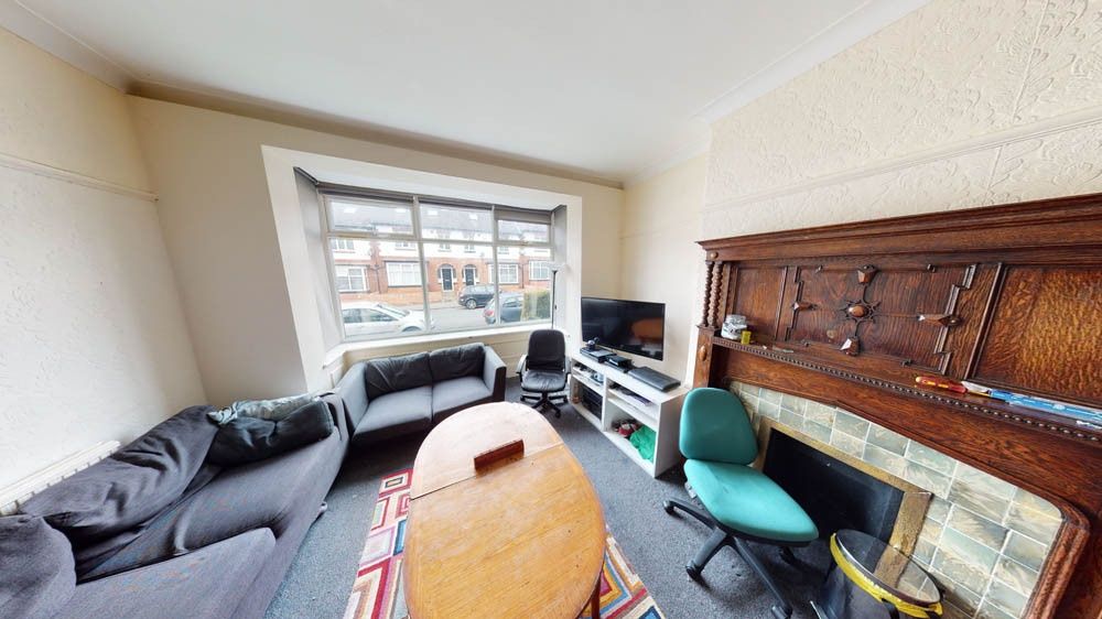 Property photo 2 of 22 Bright And Welcoming Living Room Featuring A Large...