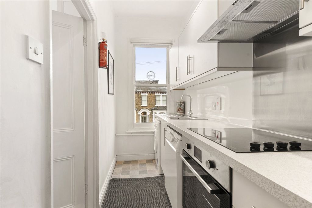 Property photo 3 of 12 Kitchen