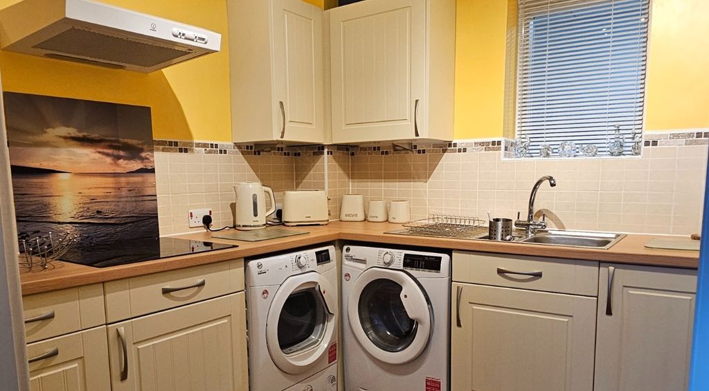 Property photo 2 of 11 Kitchen