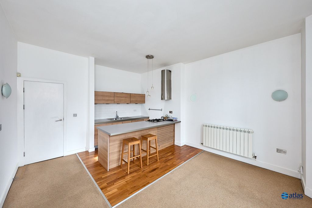 Property photo 2 of 12 Kitchen/Dining/Living Area